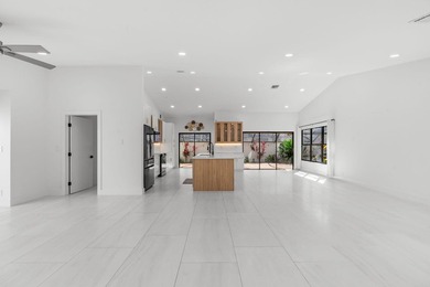 Welcome to refined living in this impeccably upgraded 3-bedroom - photo 3
