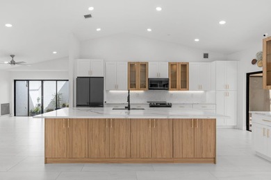 Welcome to refined living in this impeccably upgraded 3-bedroom - photo 6