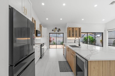 Welcome to refined living in this impeccably upgraded 3-bedroom - photo 7