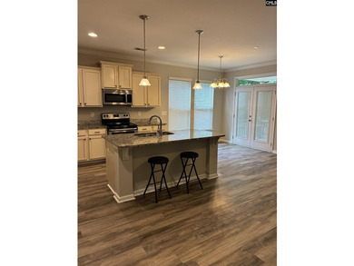 Nicely appointed with High ceilings, crown trim package * - photo 6