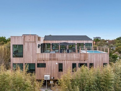 Discover the future of coastal living at this breathtaking new - photo 48