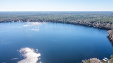 Privately nestled on 2.26 acres with approximately 150 ft of - photo 4