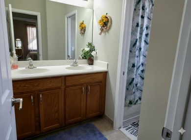 This two-story residence offers a functional 4-bedroom - photo 12