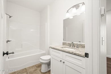 NEW CONSTRUCTION with stainless appliances in Lake Tansi Village - photo 15