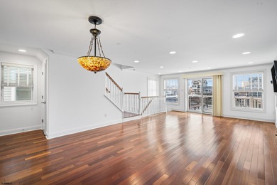 Waterfront Living with Dock, Elevator & Iconic Skyline Views -