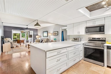 The open-concept layout comes mostly furnished and features an - photo 12