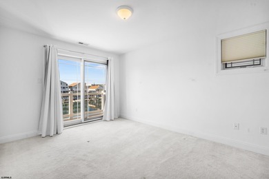 Waterfront Living with Dock, Elevator & Iconic Skyline Views -