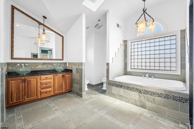 Waterfront Living with Dock, Elevator & Iconic Skyline Views -