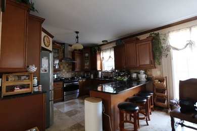 Beautiful and Rare Two-Story home, nestled in the highly - photo 2