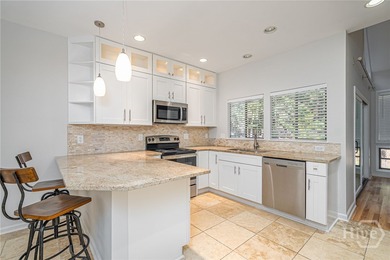 Don't miss this beautifully updated 4-bedroom, 3 full bathroom - photo 2