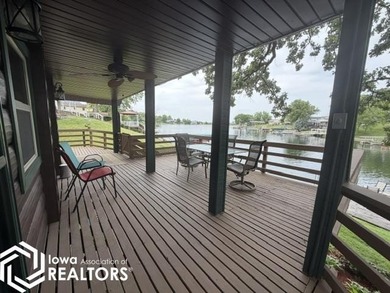 Tucked inside a quiet no-wake cove with stunning views of the - photo 6