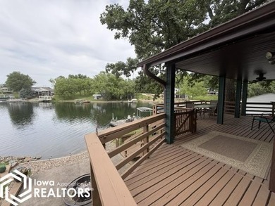 Tucked inside a quiet no-wake cove with stunning views of the - photo 7