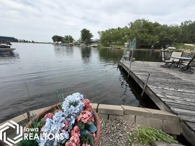 Tucked inside a quiet no-wake cove with stunning views of the - photo 8