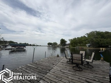 Tucked inside a quiet no-wake cove with stunning views of the - photo 9