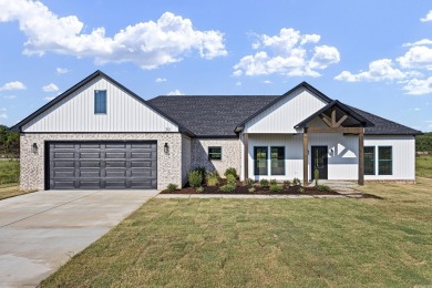 This beautiful new construction home is officially complete and