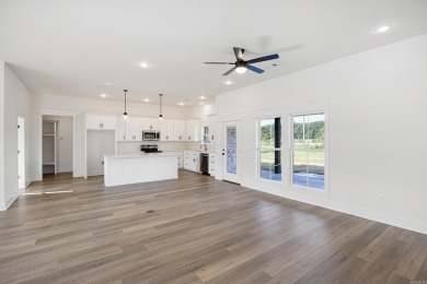 This beautiful new construction home is officially complete and