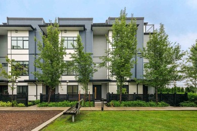 Discover over 2,000 sq. ft. of contemporary living in this - photo 1