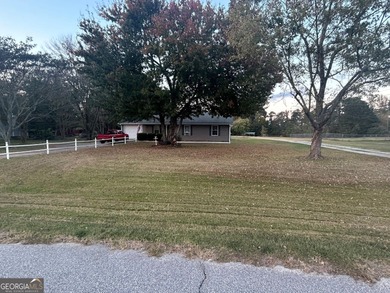 (private lake, pond, creek) Home For Sale in Loganville Georgia