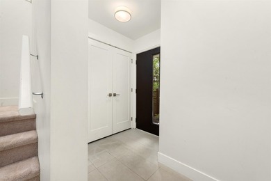 Discover over 2,000 sq. ft. of contemporary living in this - photo 2