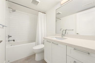 Discover over 2,000 sq. ft. of contemporary living in this - photo 5