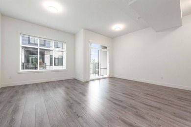 Discover over 2,000 sq. ft. of contemporary living in this - photo 8