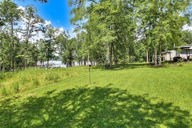 Lakefront living at its best! This property features a private - photo 31