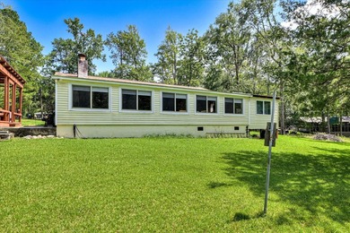Lakefront living at its best! This property features a private - photo 33