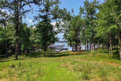 Lakefront living at its best! This property features a private - photo 36