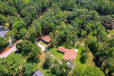 Lakefront living at its best! This property features a private - photo 37