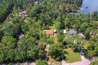 Lakefront living at its best! This property features a private - photo 39