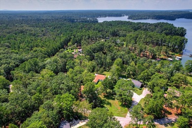 Lakefront living at its best! This property features a private - photo 43