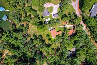 Lakefront living at its best! This property features a private - photo 47