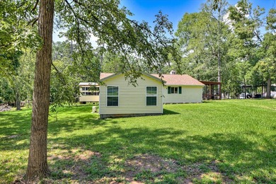 Lakefront living at its best! This property features a private - photo 48