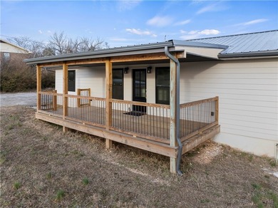 Step into this fully renovated 3-bedroom, 2-bath home located - photo 2