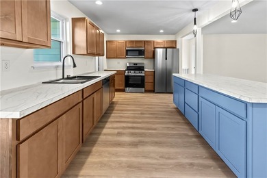 Step into this fully renovated 3-bedroom, 2-bath home located - photo 7