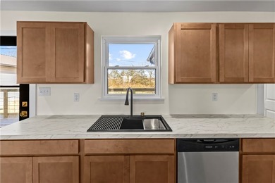 Step into this fully renovated 3-bedroom, 2-bath home located - photo 8