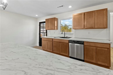 Step into this fully renovated 3-bedroom, 2-bath home located - photo 10