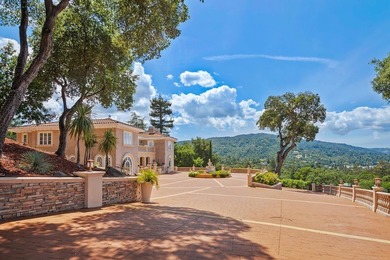 Welcome to an exquisite Mediterranean estate nestled in the - photo 1