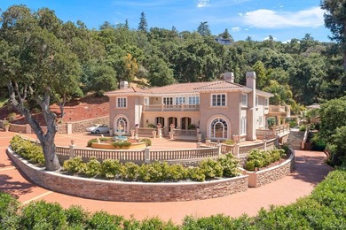 Welcome to an exquisite Mediterranean estate nestled in the - photo 2