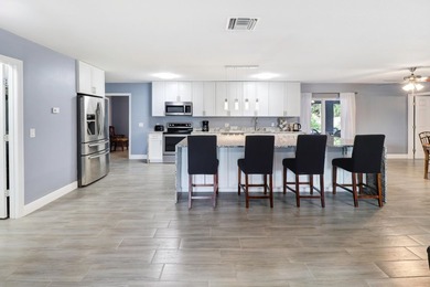 Welcome to this beautiful four-bedroom, two-bathroom single - photo 13
