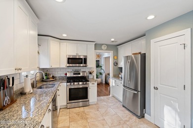 Great location! This beautifully updated home features an open - photo 9