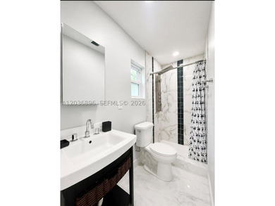 Beautifully renovated 3-bedroom home with contemporary upgrades - photo 4