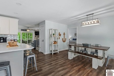 Built in 2023, this lakefront condo at Green Turtle Bay Resort & - photo 5
