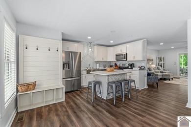 Built in 2023, this lakefront condo at Green Turtle Bay Resort & - photo 6