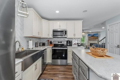 Built in 2023, this lakefront condo at Green Turtle Bay Resort & - photo 7