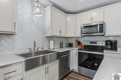 Built in 2023, this lakefront condo at Green Turtle Bay Resort & - photo 8