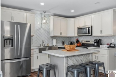 Built in 2023, this lakefront condo at Green Turtle Bay Resort & - photo 9
