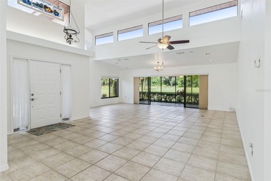 PRESENTING A BEAUTIFUL HOME ON THE GOLF COURSE! This bright and - photo 4