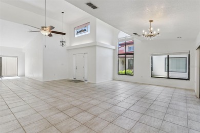 PRESENTING A BEAUTIFUL HOME ON THE GOLF COURSE! This bright and - photo 5