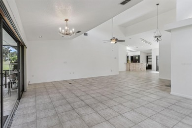 PRESENTING A BEAUTIFUL HOME ON THE GOLF COURSE! This bright and - photo 8